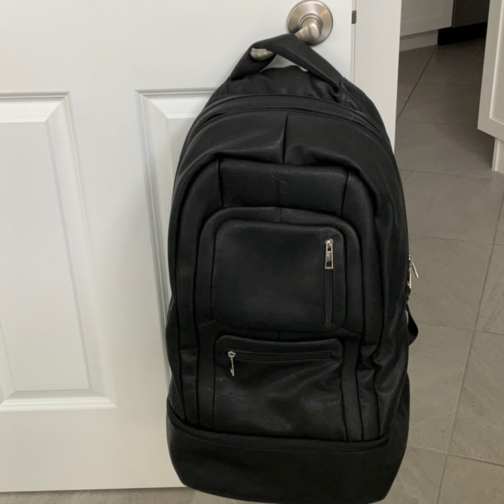 Sole Premise Black Leather carry on back pack